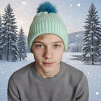 Bonnet vert pastel pom-pom turquoise