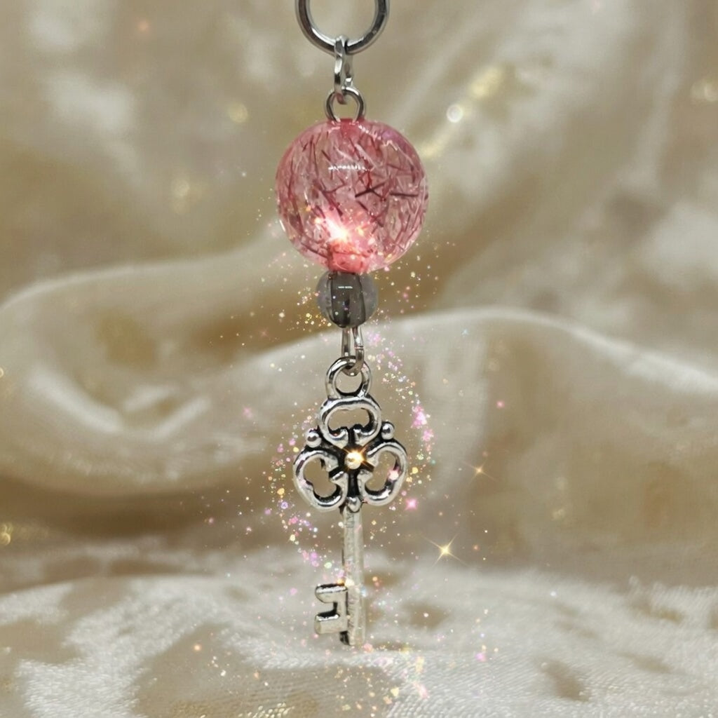 Dissocier perle rose, clé