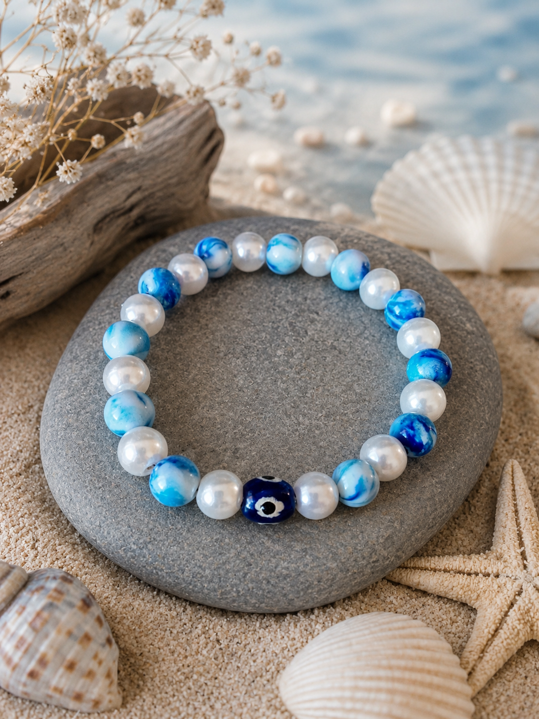 Bracelet élastique bleu, blanc,  œil du mal La fée bricole