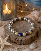Bracelet élastique beige, gris, œil du mal La fée bricole