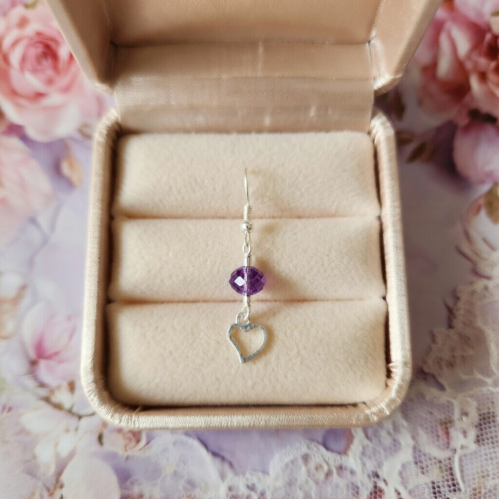 Perle violette multifacettes,  cœur argenté
