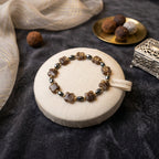 Bracelet fleurs brunes, perles doré, noir à facettes La fée bricole