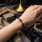 Bracelet fleurs brunes, perles doré, noir à facettes La fée bricole